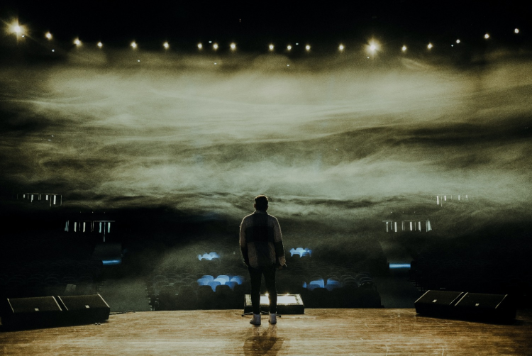 Image of Man Standing on Stage